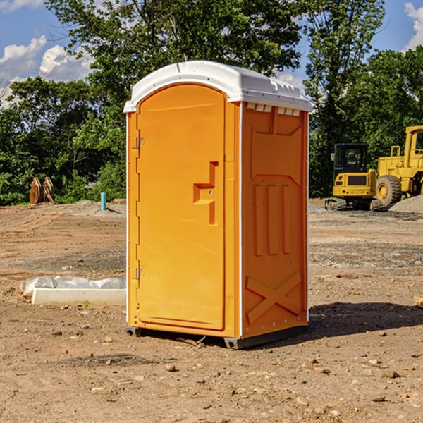 how often are the portable restrooms cleaned and serviced during a rental period in Earth